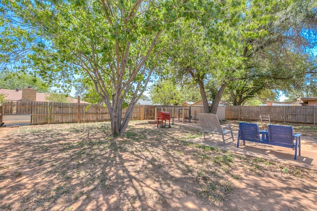 3634 Old Post Cir, San Angelo, TX 76904 - fenced backyard with a patio