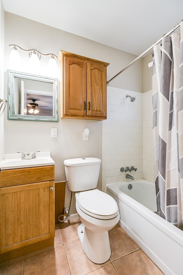 3634 Old Post Cir, San Angelo, TX 76904 - bathroom featuring vanity, toilet, shower / tub combo with curtain, and tile patterned floors