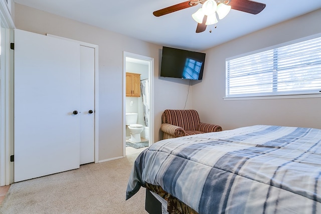 3634 Old Post Cir, San Angelo, TX 76904 - bedroom featuring carpet floors, ensuite bath, and ceiling fan