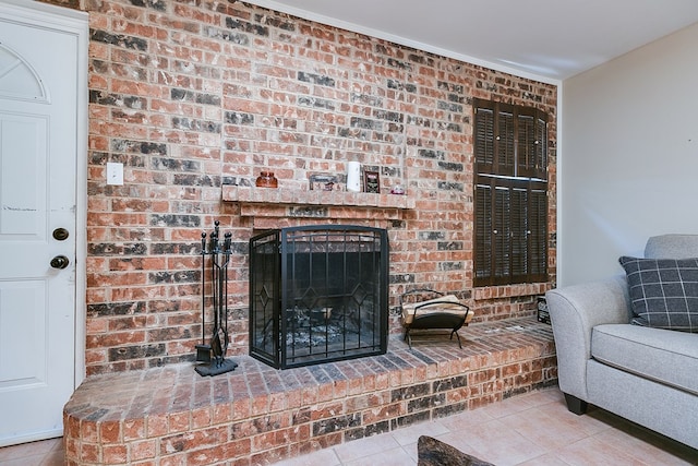 3634 Old Post Cir, San Angelo, TX 76904 - living area with tile patterned flooring, a fireplace, and brick wall