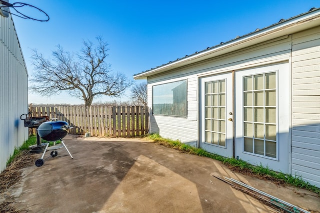 view of patio featuring a grill and french doors