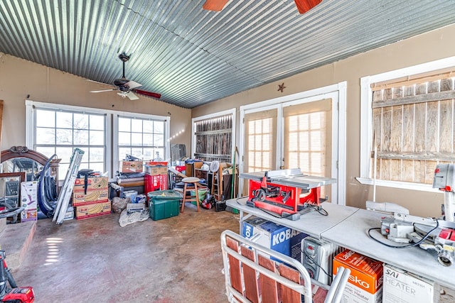 sunroom featuring ceiling fan