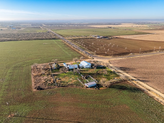 birds eye view of property featuring a rural view