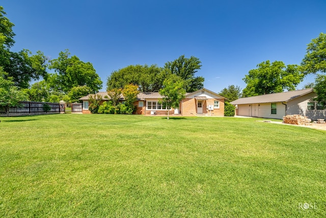 1322 S Monroe St, San Angelo, TX 76901 - view of yard featuring a detached garage