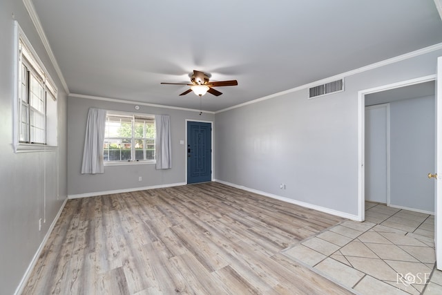 3109 College Hills Cir, San Angelo, TX 76904 - spare room with a ceiling fan, light wood-type flooring, and ornamental molding