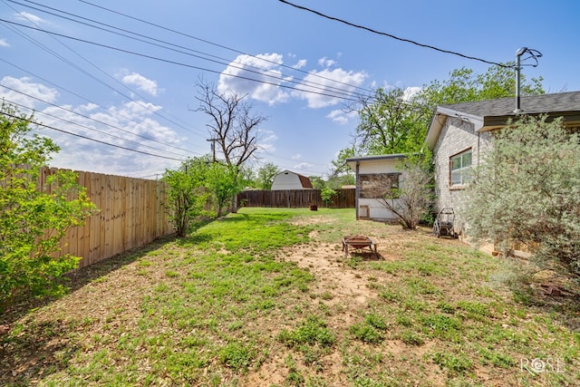 3109 College Hills Cir, San Angelo, TX 76904 - fenced backyard featuring an outdoor fire pit