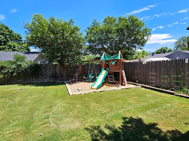 view of play area with a yard