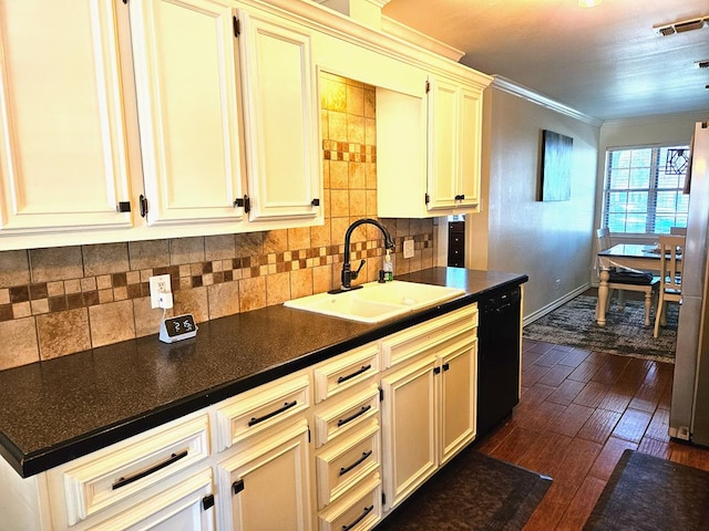 kitchen featuring stainless steel refrigerator, dishwasher, sink, crown molding, and dark wood-type flooring