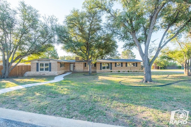 ranch-style house with a front yard