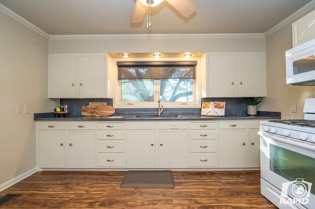 kitchen with sink, white cabinets, decorative backsplash, crown molding, and white appliances