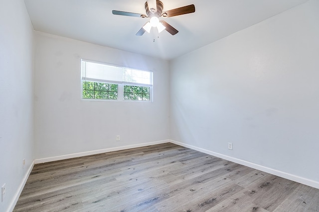 2021 Field Ave, San Angelo, TX 76901 - spare room with wood finished floors, baseboards, and a ceiling fan