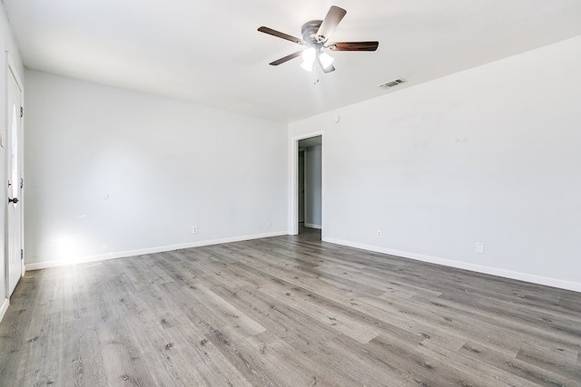 2021 Field Ave, San Angelo, TX 76901 - empty room with wood finished floors, ceiling fan, and baseboards