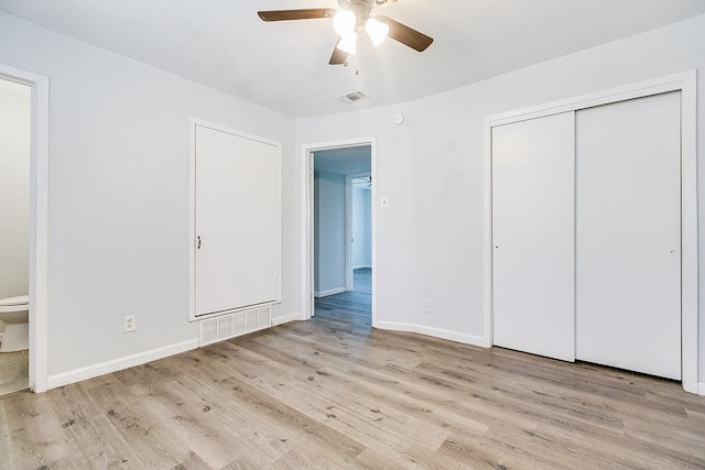 2021 Field Ave, San Angelo, TX 76901 - unfurnished bedroom with wood finished floors, baseboards, and a closet
