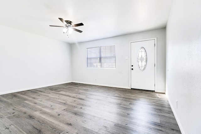 2021 Field Ave, San Angelo, TX 76901 - foyer featuring a ceiling fan, wood finished floors, and baseboards