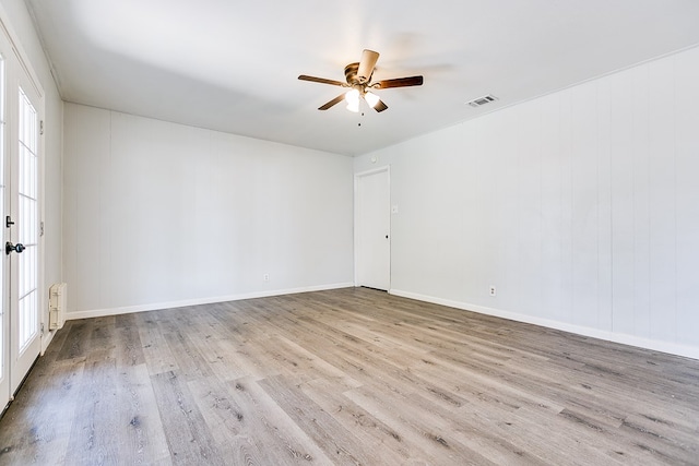 2021 Field Ave, San Angelo, TX 76901 - spare room featuring a ceiling fan, wood finished floors, and baseboards