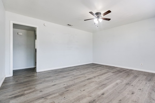 2021 Field Ave, San Angelo, TX 76901 - empty room with a ceiling fan, wood finished floors, and baseboards