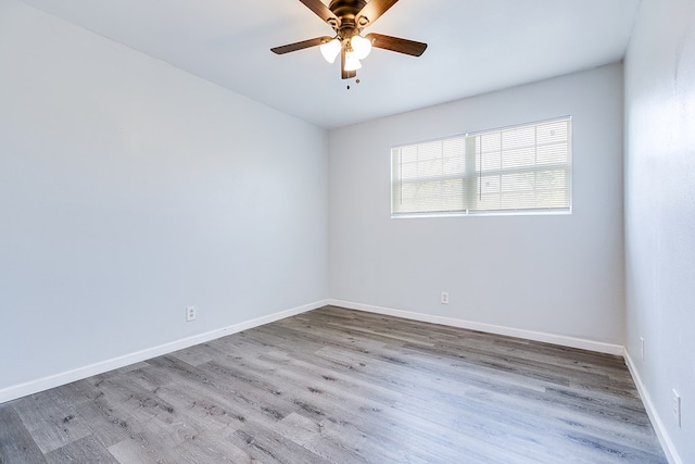 2021 Field Ave, San Angelo, TX 76901 - unfurnished room featuring ceiling fan, wood finished floors, and baseboards