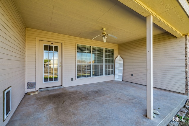 view of patio featuring ceiling fan