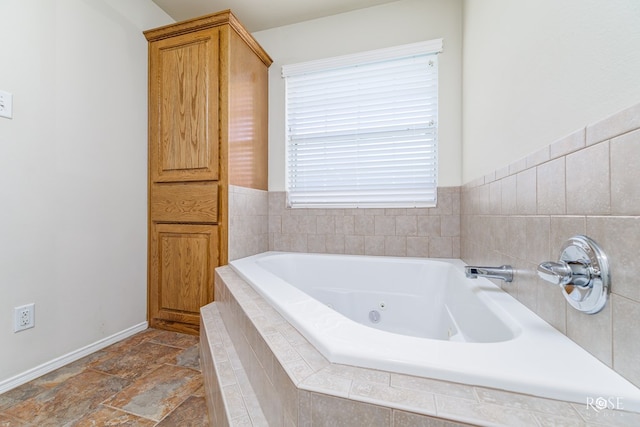 bathroom featuring tiled bath