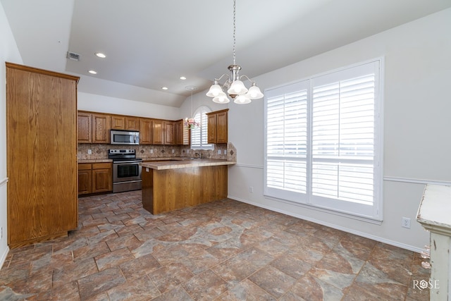 kitchen with lofted ceiling, tasteful backsplash, hanging light fixtures, kitchen peninsula, and stainless steel appliances