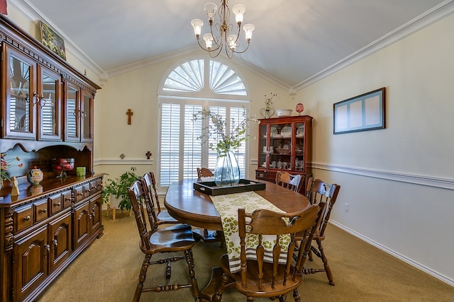 dining area featuring lofted ceiling, a notable chandelier, crown molding, and light carpet