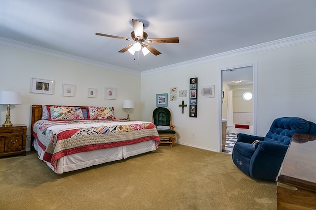 bedroom with crown molding, carpet, ceiling fan, and ensuite bath