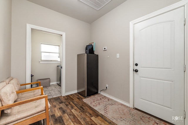 foyer featuring dark hardwood / wood-style flooring