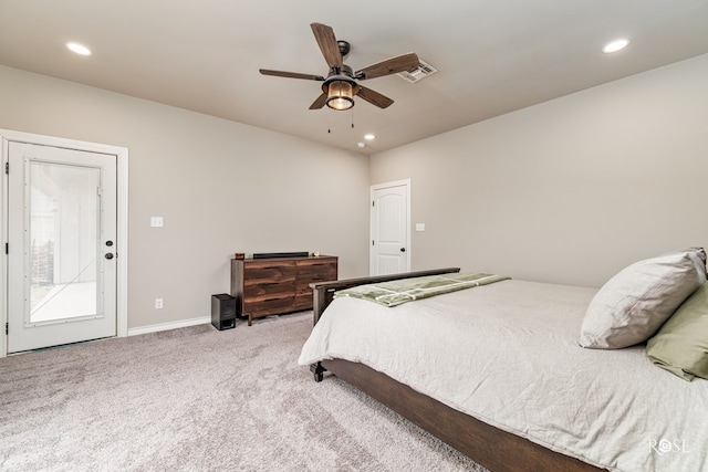 carpeted bedroom with ceiling fan