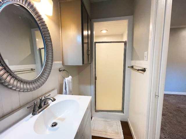 bathroom with vanity and crown molding