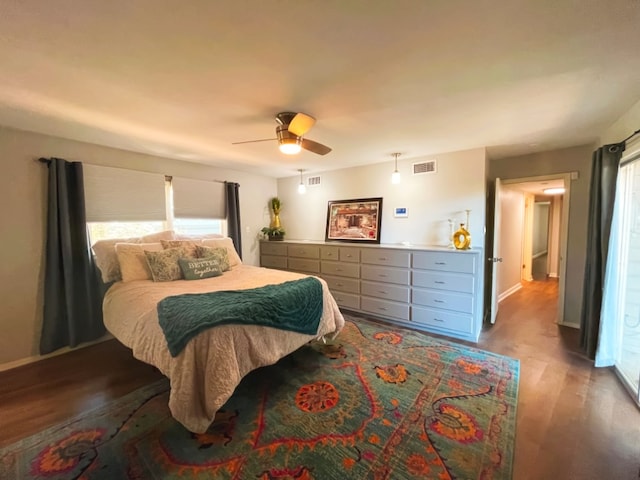 bedroom featuring wood-type flooring and ceiling fan