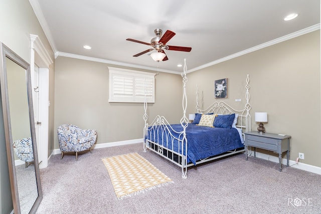 carpeted bedroom with crown molding and ceiling fan