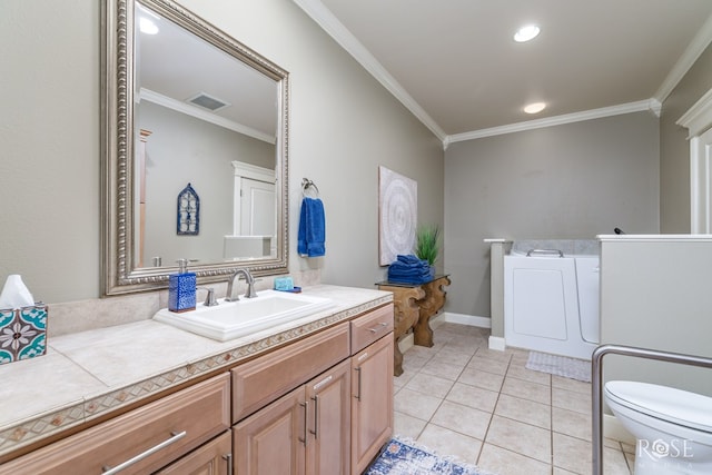 bathroom featuring vanity, tile patterned floors, ornamental molding, and toilet