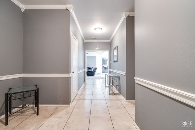 4122 Harmony Ln, San Angelo, TX 76904 - hallway featuring light tile patterned floors and crown molding