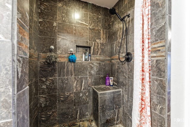 bathroom featuring a shower with curtain