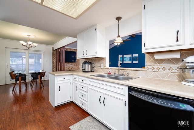 kitchen with sink, black dishwasher, pendant lighting, and white cabinets