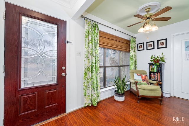 foyer entrance featuring hardwood / wood-style floors and ceiling fan