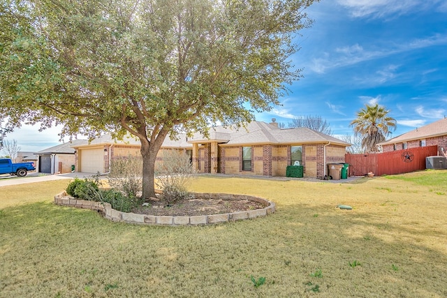 1113 Windemere Cir, San Angelo, TX 76901 - ranch-style home with concrete driveway, brick siding, central AC unit, and an attached garage