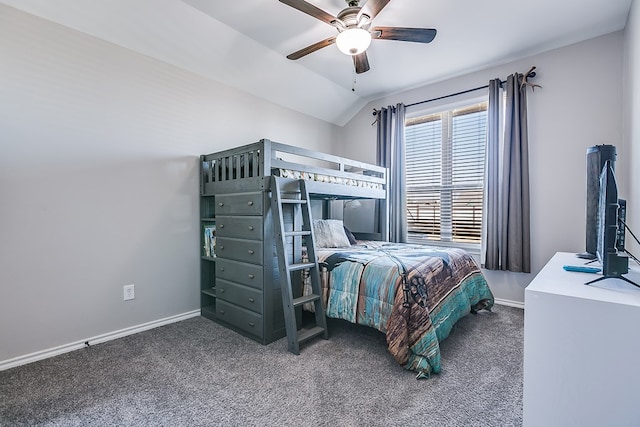 bedroom featuring baseboards, lofted ceiling, a ceiling fan, and carpet flooring