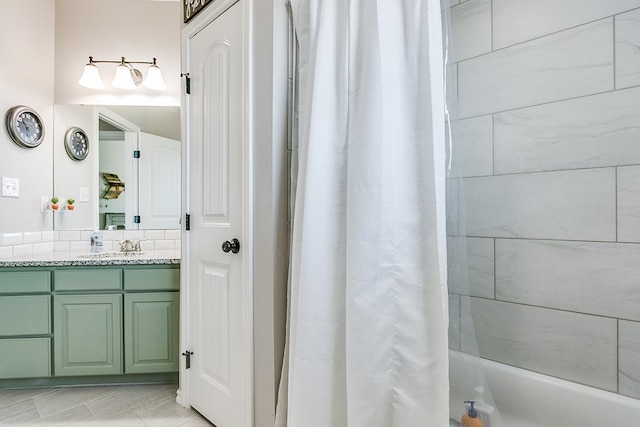 full bathroom featuring vanity and shower / bath combo