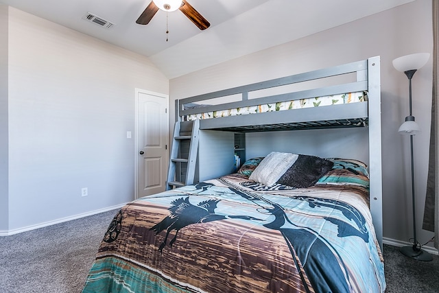 carpeted bedroom with vaulted ceiling, baseboards, visible vents, and ceiling fan