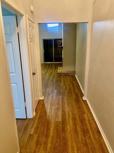 2608 Sunset Dr, San Angelo, TX 76904 - hallway with wood finished floors