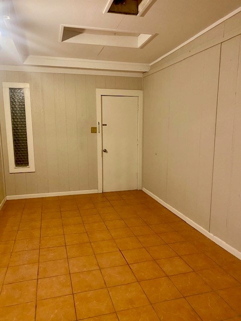 2608 Sunset Dr, San Angelo, TX 76904 - unfurnished room featuring tile patterned flooring and crown molding