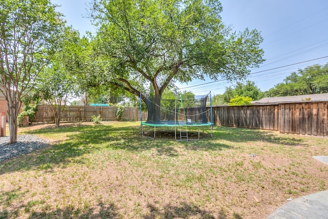2622 Oxford Ave, San Angelo, TX 76904 - view of yard with a trampoline