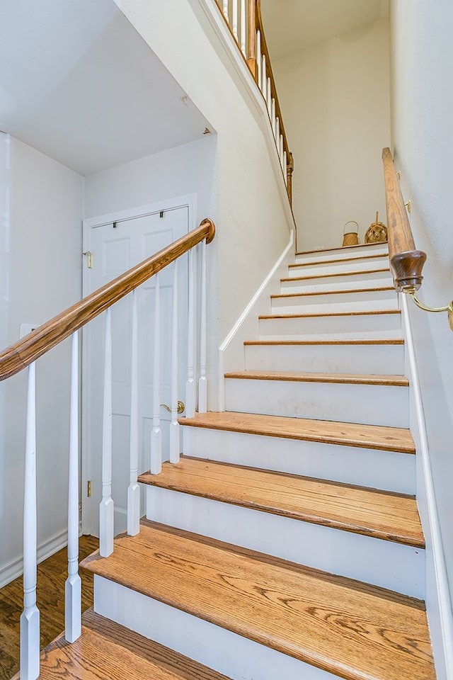 2622 Oxford Ave, San Angelo, TX 76904 - staircase featuring wood finished floors