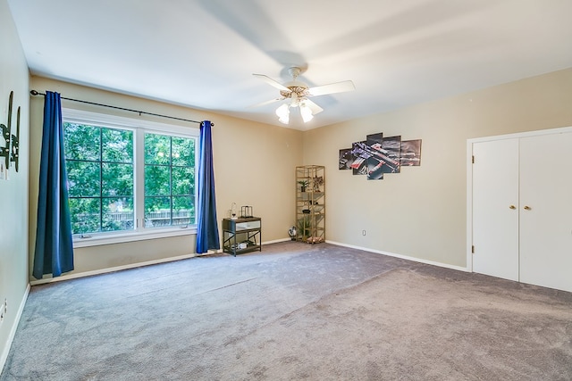 2622 Oxford Ave, San Angelo, TX 76904 - carpeted spare room featuring a ceiling fan and baseboards