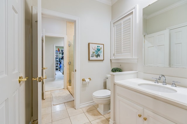 2622 Oxford Ave, San Angelo, TX 76904 - bathroom featuring tile patterned flooring, crown molding, vanity, and toilet