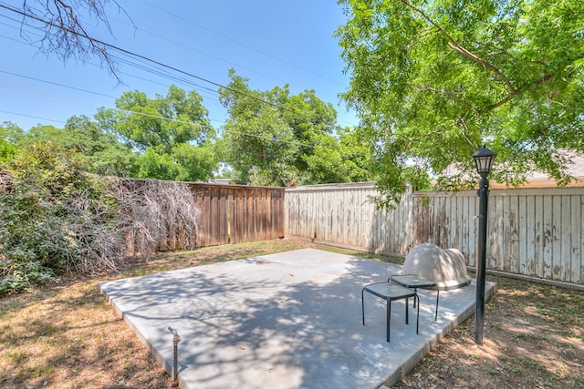 2622 Oxford Ave, San Angelo, TX 76904 - fenced backyard featuring a patio area