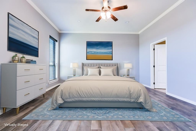 bedroom with ceiling fan, wood finished floors, baseboards, and ornamental molding