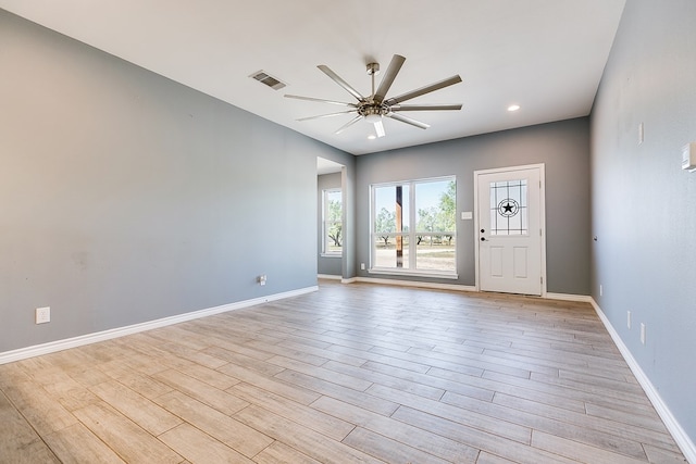 interior space featuring light hardwood / wood-style flooring and ceiling fan