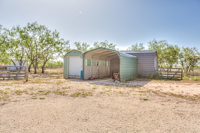 view of outbuilding featuring a carport